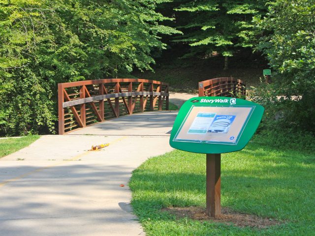 The first StoryWalk post at Umstead Park.